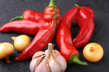 Red hot Chili pepper, garlic and onion. Fresh Organic vegetables.