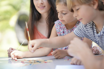 Happy family enjoying playing game together
