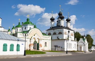Fototapeta na wymiar Cathedral St. Procopia Ustyuzhsky and Cathedral of St. John of Ustyug en embankment of river Suhona, Veliky Ustyug, Vologda region