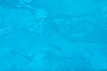 Surface of blue swimming pool. texture of water background in swimming pool
