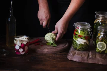 Foto op Canvas Canning food in pickled jars vegetables preserve © casanisa
