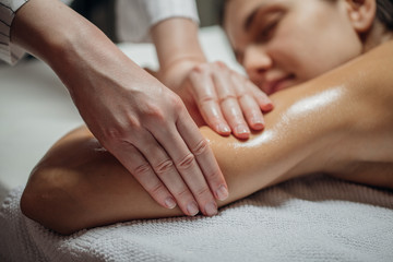Woman Enjoying Arms and Shoulders Massage.