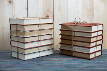 group of colorful books on the wooden table