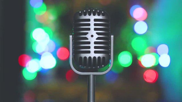 Close up Vintage microphone and lighting with bokeh background
