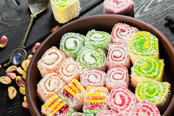 Turkish delight on a wooden table.