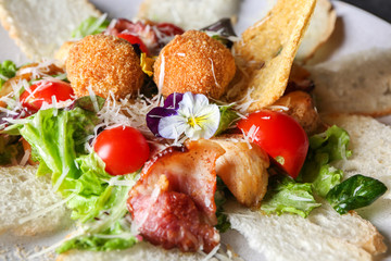 Delicious fresh salad with bread on plate, closeup
