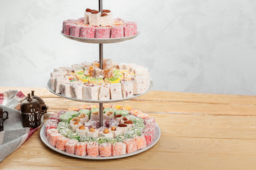 Turkish delight on a wooden table.