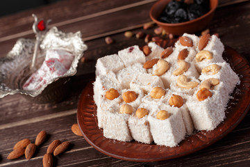 Turkish delight on a wooden table.