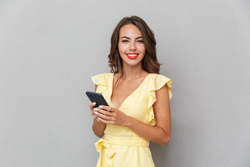 Portrait of a confident young girl in dress