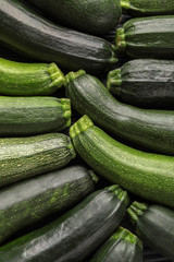 Ripe zucchinis as background