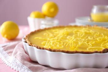 Tasty lemon pie on table, closeup