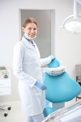 Young female dentist in clinic