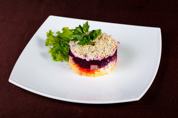 Russian salad with herring