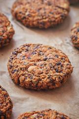 Vegan quinoa and bean burgers made with beans, quinoa, nori algae, oats, smoked peppers and onions