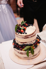 Sweet wedding cake made from fresh berry cupcake