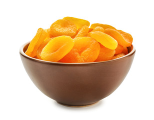 Fototapeta na wymiar Bowl with dried apricots on white background