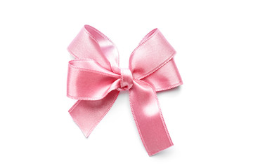 Bow from pink satin ribbon on white background