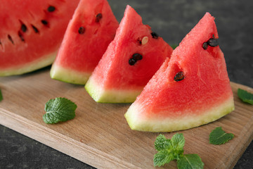 Delicious cut watermelon on board, closeup
