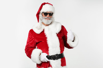 Portrait of cool Santa Claus on white background