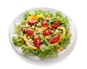 Plate with healthy fresh salad on white background