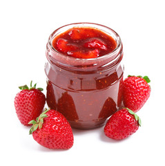 Glass jar with delicious strawberry jam on white background