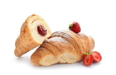 Tasty croissants with raspberry jam on white background