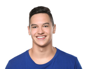 Young man with healthy teeth smiling on white background