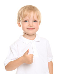 Cute little boy showing thumb-up gesture on white background