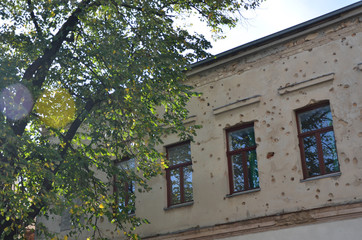 Destroyed and damaged building during war in Bosnia. The mark of bullets still can be seen around Mostar.