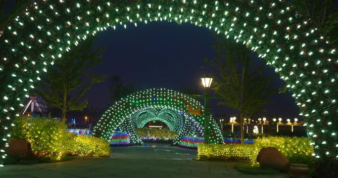 Street festival decoration with colorful Christmas LED lights for new year holidays