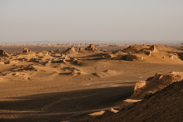 Sunrise in the Lut Desert (also Kalut desert), one of the driest and hottest places in the world.