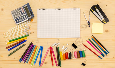 Fototapeta na wymiar Back to school background with colored pencils