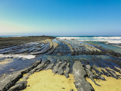 Rock formations at Amoreira Beach in Aljezur
