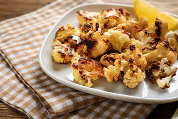 Tasty grilled cauliflower on plate