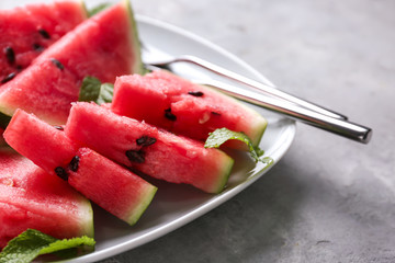 Slices of ripe watermelon on plate, closeup