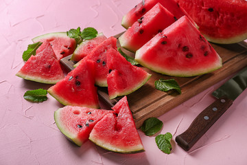 Slices of ripe watermelon on color table