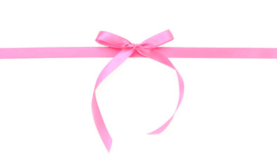 Pink ribbon with bow on white background
