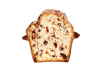 Half of muffin with chips of chocolate and powdered sugar, isolated on white background