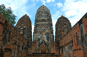 Ancient statues and buildings in sukhothai historical park, Thailand