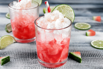 Fresh summer cocktail in glasses on wooden table