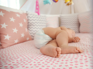 Fototapeta na wymiar Cute little baby sleeping in crib