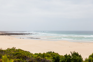 The long white sandy dune beach of Cape St Francis, South Africa.