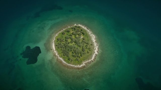 Aerial view of the St. Athanasios island in the Gulf of Corinth, Greece.