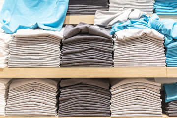 Color full stack of  t-shirt in shopping mall or department store.