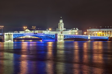 Fototapeta na wymiar Palace Bridge and Kunstkamera during New Year and Christmas holidays, Saint Petersburg, Russia