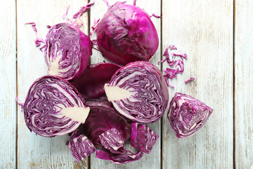 Sliced red cabbage on light wooden table