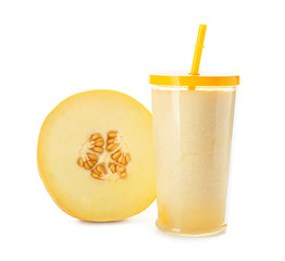 Glass of delicious melon smoothie on white background