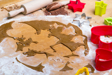 Preparing Christmas gingerbread cookies. Gingerbread dough and cookies ingredients.