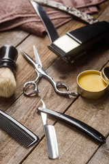 Wax, straight razor and scissors
