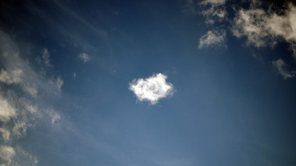 Naklejka na ściany i meble Blue sky with some clouds. background.